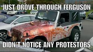 running over ferguson protestors
